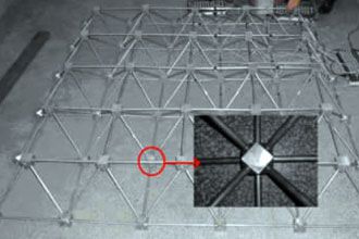 Comparison of Structural Performance Between Quadrangle Pyramidal Space Frame and Evacuated Quadrangle Space Frame