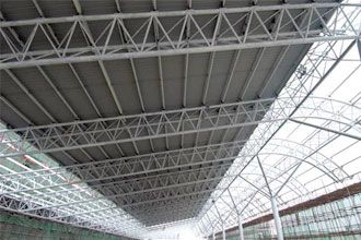 Space tube trusses design for long-span steel structures